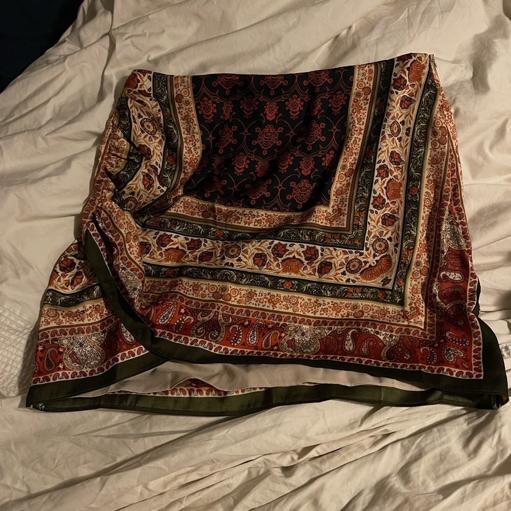 Never worn- adorable skirt just a tad to small and missed the return window